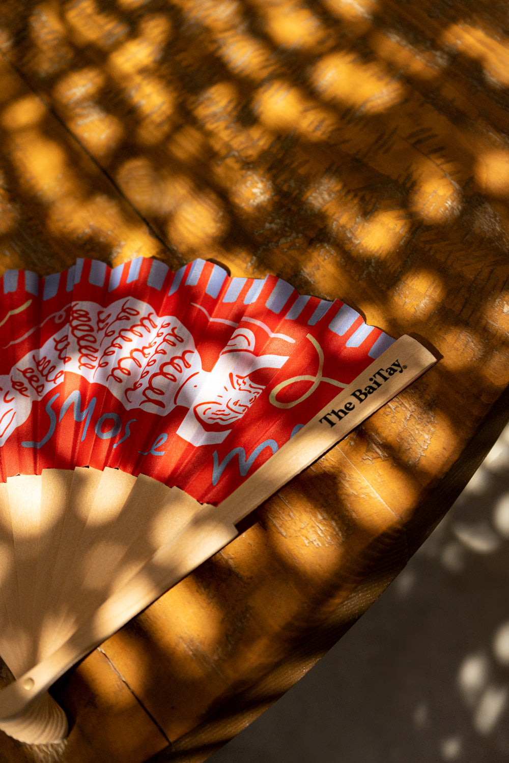 Coral hand fan